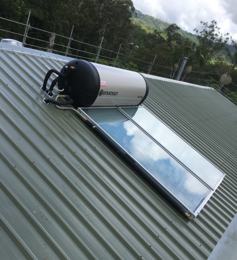 Solar hot water system fitted to a corrugated metal roof in Nambour